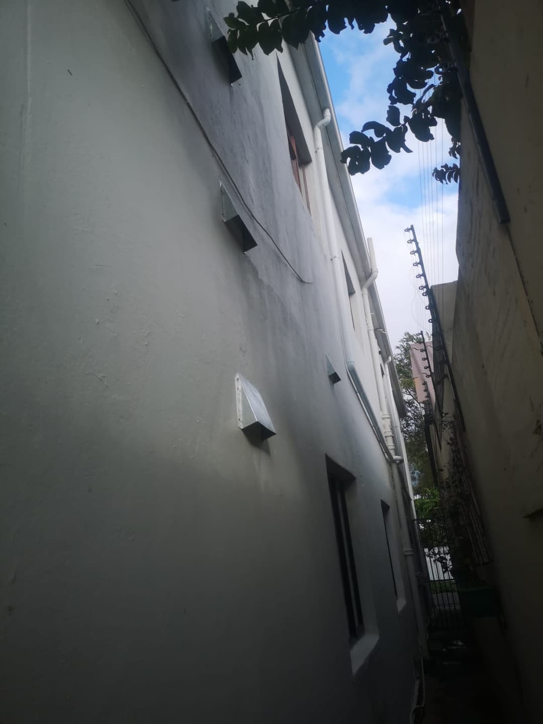Row of vent covers along a narrow passage