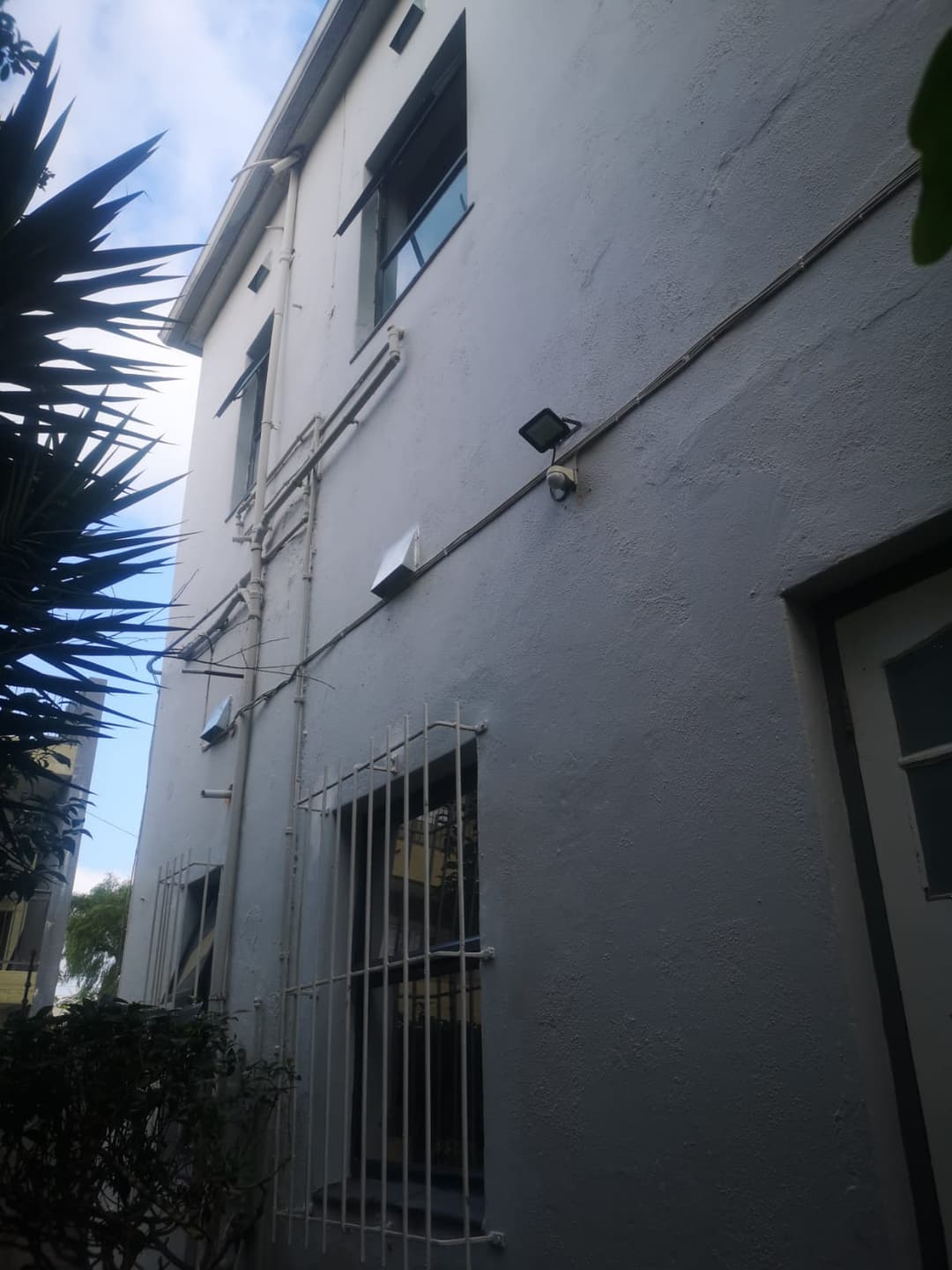 Vent covers fitted high up on a side wall