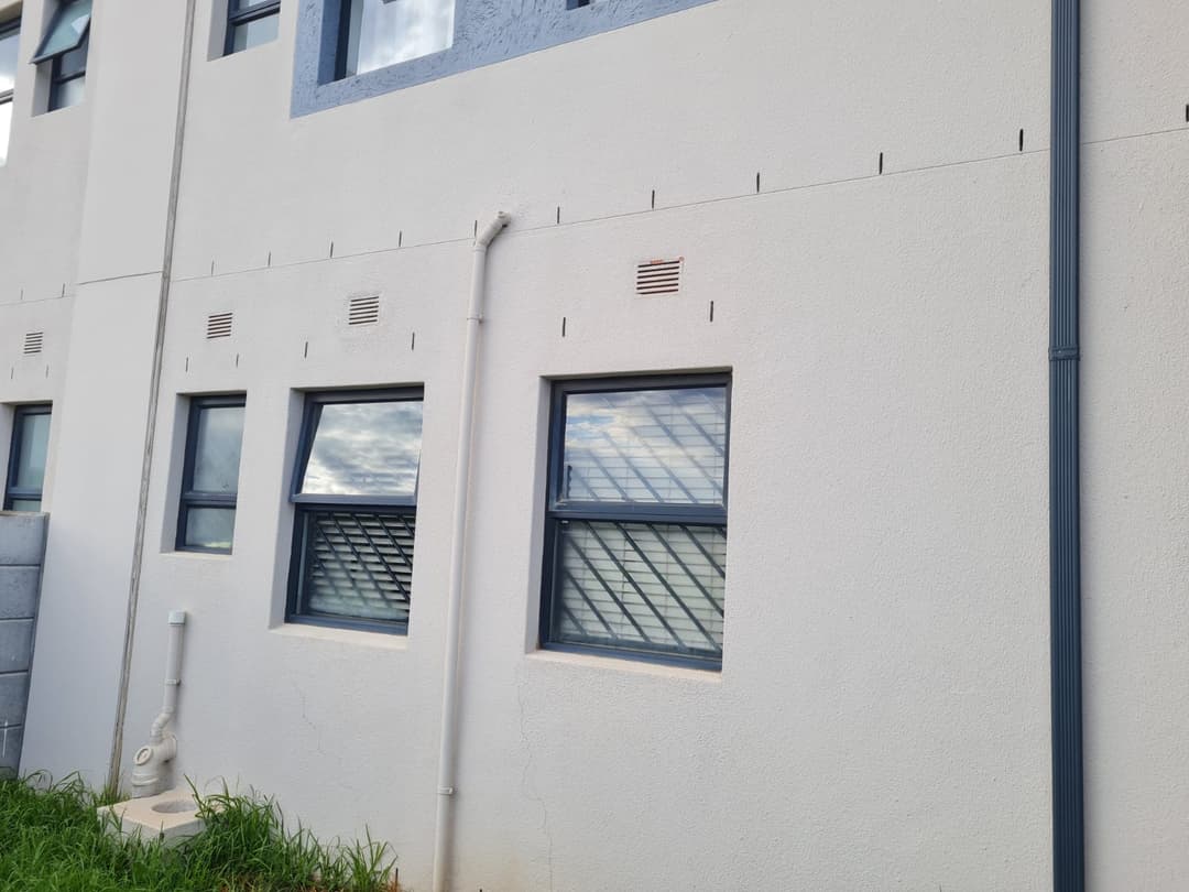 Unprotected vents on a plastered wall
